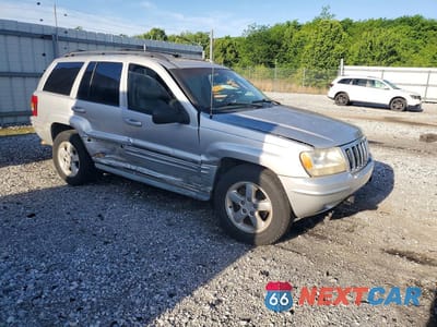 Czwarte zdjęcie samochodu z boku: 2003 JEEP GRAND CHEROKEE OVERLAND VIN:1J8GW68J93C532310 - miniatura
