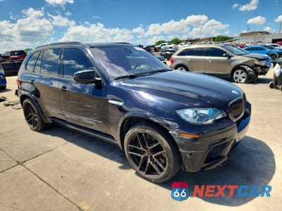 Czwarte zdjęcie samochodu z boku: 2012 BMW X5 M VIN:5YMGY0C5XCLK27723 - miniatura