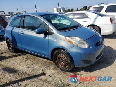 Czwarte zdjęcie samochodu z boku: 2009 TOYOTA YARIS BASE VIN:JTDJT903295246798 - miniatura