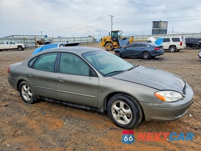 Czwarte zdjęcie samochodu z boku: 2001 FORD TAURUS SES VIN:1FAFP55291A249847 - miniatura