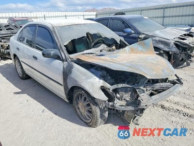 Czwarte zdjęcie samochodu z boku: 2005 HONDA CIVIC DX VP VIN:2HGES16345H571888 - miniatura