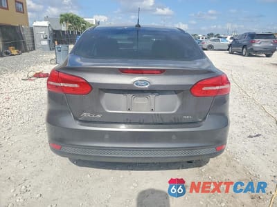 Zdjęcie 6 z 12 samochodu: 2018 FORD FOCUS SEL VIN:1FADP3H29JL265882 - miniatura