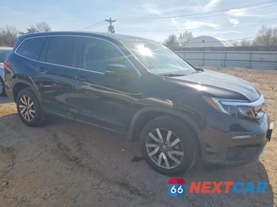 Czwarte zdjęcie samochodu z boku: 2020 HONDA PILOT EXL VIN:5FNYF6H57LB047391 - miniatura