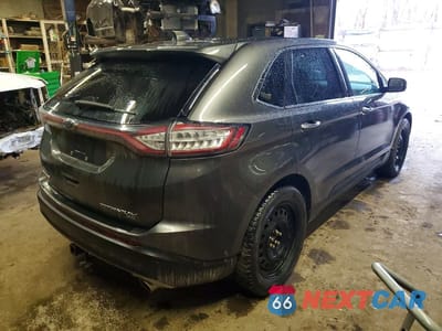 Trzecie zdjęcie samochodu z tyłu: 2016 FORD EDGE TITANIUM VIN:2FMPK4K84GBB97004 - miniatura