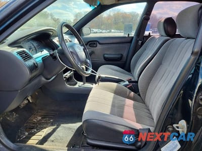 Zdjęcie 7 z 11 samochodu: 1996 TOYOTA COROLLA BASE VIN:1NXBA02E1TZ475566 - miniatura