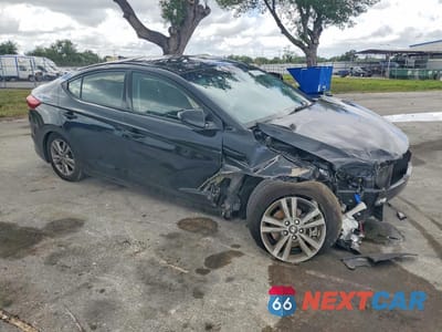 Czwarte zdjęcie samochodu z boku: 2018 HYUNDAI ELANTRA VALUE EDITION VIN:5NPD84LF7JH392402 - miniatura
