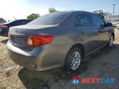 Trzecie zdjęcie samochodu z tyłu: 2010 TOYOTA COROLLA LE VIN:JTDBU4EE6AJ077458 - miniatura