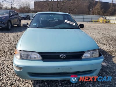 Piąte zdjęcie samochodu w środku: 1994 TOYOTA COROLLA DX VIN:1NXAE09B1RZ183033 - miniatura