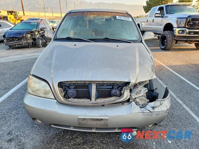 Piąte zdjęcie samochodu w środku: 2004 KIA SEDONA LX VIN:KNDUP131746602825 - miniatura