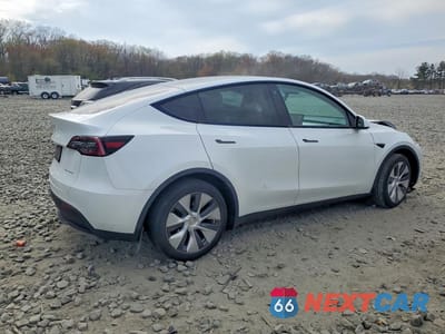 Trzecie zdjęcie samochodu z tyłu: 2023 TESLA MODEL Y VIN:7SAYGDEE9PA105352 - miniatura