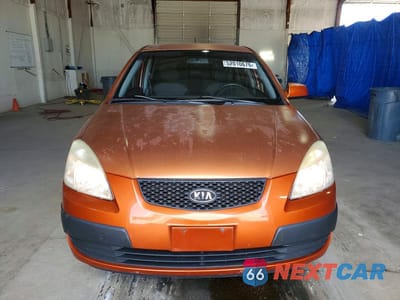 Piąte zdjęcie samochodu w środku: 2009 KIA RIO BASE VIN:KNADE223796534285 - miniatura