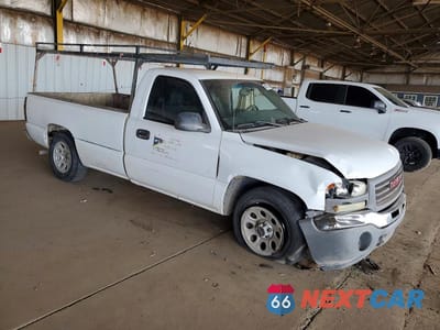 Czwarte zdjęcie samochodu z boku: 2005 GMC NEW SIERRA C1500 VIN:1GTEC14VX5Z900321 - miniatura