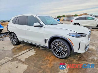 Czwarte zdjęcie samochodu z boku: 2026 BMW X5 XDRIVE40I VIN:5UX23EU00T9328881 - miniatura