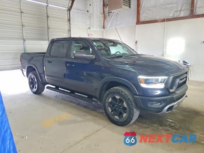 Czwarte zdjęcie samochodu z boku: 2019 RAM 1500 REBEL VIN:1C6SRFLT9KN876408 - miniatura