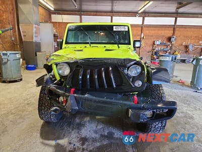 Piąte zdjęcie samochodu w środku: 2016 JEEP WRANGLER UNLIMITED RUBICON VIN:1C4BJWFG8GL335674 - miniatura