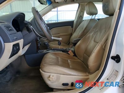 Zdjęcie 7 z 11 samochodu: 2010 FORD FUSION SEL VIN:3FAHP0JG2AR297029 - miniatura