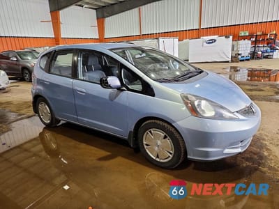 Czwarte zdjęcie samochodu z boku: 2009 HONDA FIT LX VIN:JHMGE88509S806726 - miniatura
