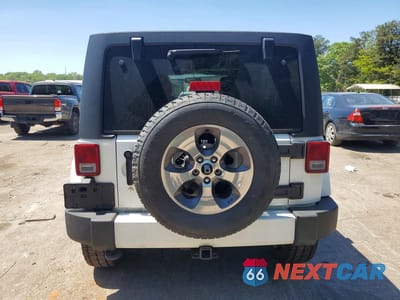 Zdjęcie 6 z 12 samochodu: 2016 JEEP WRANGLER UNLIMITED SAHARA VIN:1C4BJWEG7GL144264 - miniatura