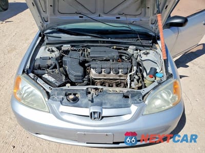 Zdjęcie 11 z 12 samochodu: 2002 HONDA CIVIC LX VIN:1HGEM21562L002919 - miniatura