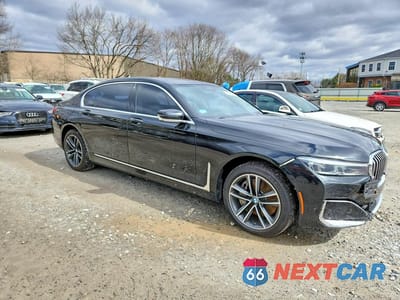 Czwarte zdjęcie samochodu z boku: 2020 BMW 750 XI VIN:WBA7U2C03LGM27319 - miniatura