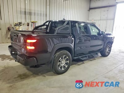 Trzecie zdjęcie samochodu z tyłu: 2022 NISSAN FRONTIER PRO-4X VIN:1N6ED1EK3NN674600 - miniatura