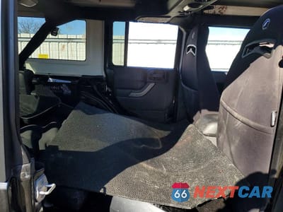 Zdjęcie 10 z 12 samochodu: 2016 JEEP WRANGLER SPORT VIN:1C4BJWDG4GL104841 - miniatura