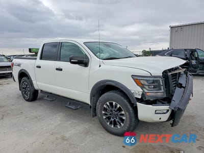 Czwarte zdjęcie samochodu z boku: 2021 NISSAN TITAN PRO-4X VIN:1N6AA1ED8MN535103 - miniatura
