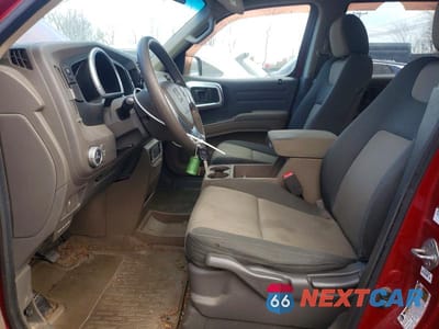 Zdjęcie 7 z 12 samochodu: 2006 HONDA RIDGELINE RT VIN:2HJYK16226H528456 - miniatura