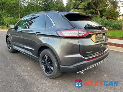 Trzecie zdjęcie samochodu z tyłu: 2016 FORD EDGE SEL VIN:2FMPK3J81GBB95299 - miniatura