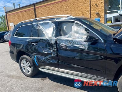 Zdjęcie 11 z 12 samochodu: 2015 MERCEDES-BENZ GL 450 4MATIC VIN:4JGDF6EE4FA475169 - miniatura