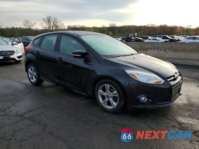 Czwarte zdjęcie samochodu z boku: 2012 FORD FOCUS VIN:1FAHP3K21CL327031 - miniatura
