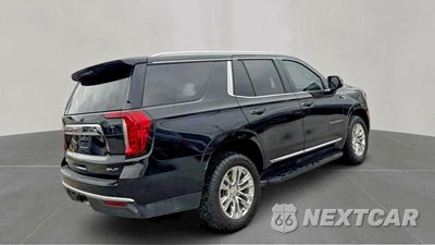 Czwarte zdjęcie samochodu z boku: 2022 GMC YUKON SLT VIN:1GKS2BKT7NR237808 - miniatura