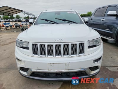 Piąte zdjęcie samochodu w środku: 2014 JEEP GRAND CHEROKEE SUMMIT VIN:1C4RJFJM3EC426232 - miniatura