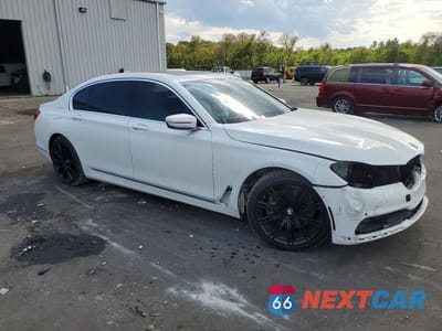 Czwarte zdjęcie samochodu z boku: 2019 BMW 740 I VIN:WBA7E2C54KB217719 - miniatura