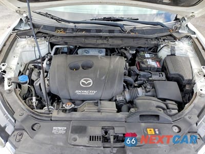 Zdjęcie 12 z 12 samochodu: 2016 MAZDA CX-5 TOURING VIN:JM3KE2CY4G0635635 - miniatura