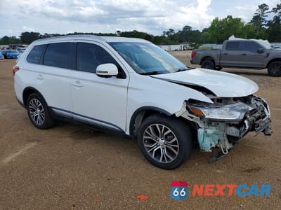 Czwarte zdjęcie samochodu z boku: 2018 MITSUBISHI OUTLANDER SE VIN:JA4AD3A33JZ046402 - miniatura