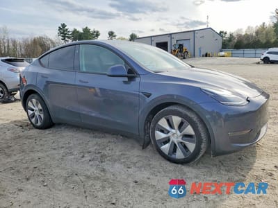 Czwarte zdjęcie samochodu z boku: 2023 TESLA MODEL Y VIN:7SAYGDEE7PA207894 - miniatura