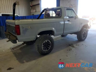 Trzecie zdjęcie samochodu z tyłu: 1987 FORD RANGER VIN:1FTCR11T0HUA88442 - miniatura