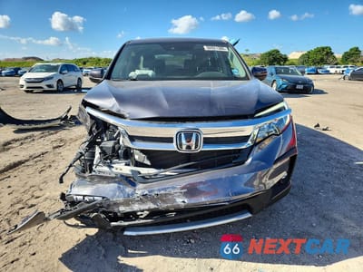 Piąte zdjęcie samochodu w środku: 2022 HONDA PILOT EXL VIN:5FNYF5H58NB006605 - miniatura