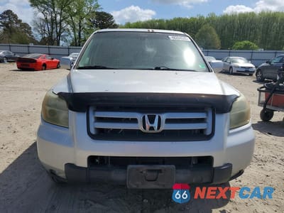Piąte zdjęcie samochodu w środku: 2006 HONDA PILOT EX VIN:5FNYF18656B014163 - miniatura