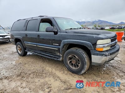 Czwarte zdjęcie samochodu z boku: 2000 CHEVROLET SUBURBAN K2500 VIN:3GNGK26U1YG175063 - miniatura