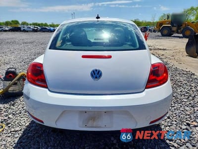 Zdjęcie 6 z 12 samochodu: 2013 VOLKSWAGEN BEETLE VIN:3VWJL7AT2DM683509 - miniatura