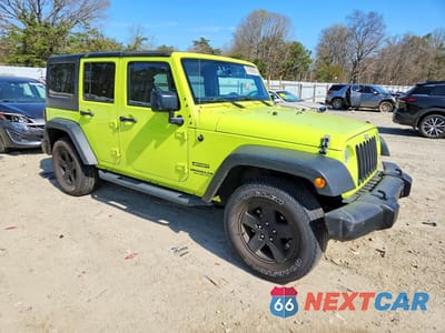 Czwarte zdjęcie samochodu z boku: 2016 JEEP WRANGLER UNLIMITED SPORT VIN:1C4HJWDG9GL295702 - miniatura
