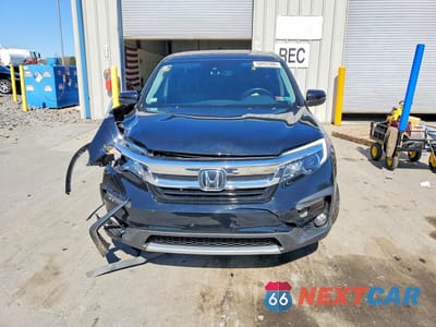 Piąte zdjęcie samochodu w środku: 2021 HONDA PILOT EXL VIN:5FNYF6H56MB099452 - miniatura