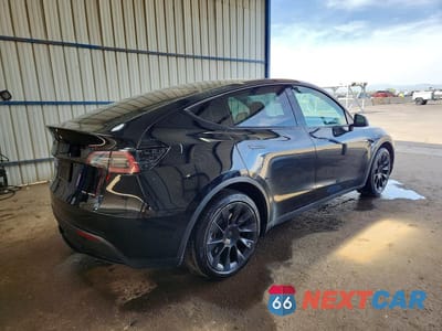 Trzecie zdjęcie samochodu z tyłu: 2022 TESLA MODEL Y VIN:7SAYGDEE9NF480769 - miniatura