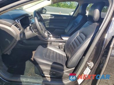Zdjęcie 7 z 12 samochodu: 2019 FORD FUSION SEL VIN:3FA6P0MU0KR137371 - miniatura