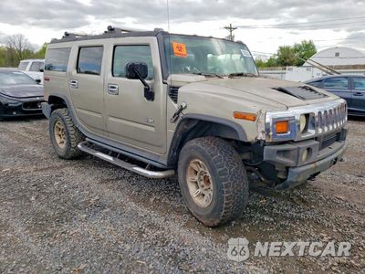 Czwarte zdjęcie samochodu z boku: 2004 HUMMER H2 VIN:5GRGN23U64H118618 - miniatura