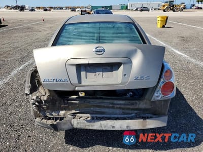 Zdjęcie 6 z 13 samochodu: 2003 NISS ALTIMA S MANUAL VIN:1N4AL11D43C322796 - miniatura