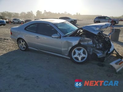 Czwarte zdjęcie samochodu z boku: 2001 MERCEDES-BENZ CLK 430 VIN:WDBLJ70G61F175379 - miniatura