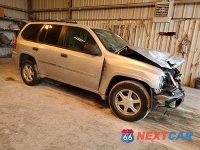 Czwarte zdjęcie samochodu z boku: 2009 GMC ENVOY SLE VIN:1GKDS33SX92117018 - miniatura